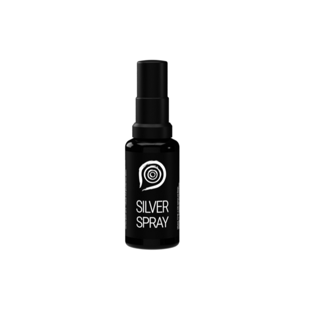 A 15ml bottle of The Health Factory Nano Silver Spray in dark violet glass, featuring a label with product details and illustrating the ultra-fine nano silver particles suspended in purified water for topical use
