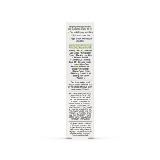 Creamy eye serum with hemp oil and botanical extracts displayed on a natural wooden surface