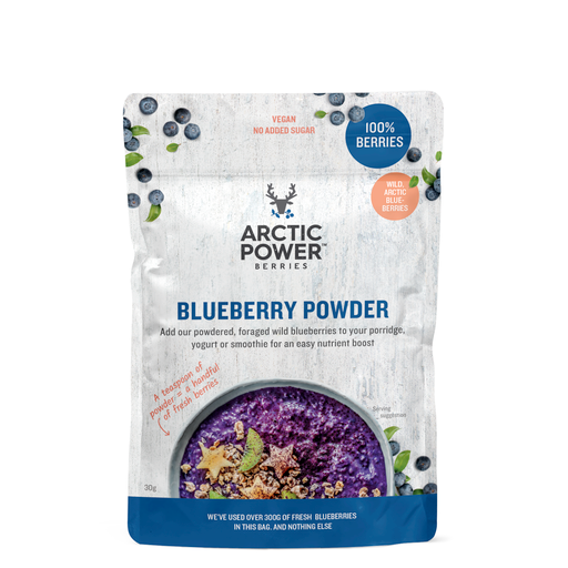 A close-up of Arctic Power Berries Blueberry Powder in a clear jar, showing its vibrant, fine blue-purple texture made from wild, nutrient-rich Arctic blueberries from Finland, highlighting its natural, antioxidant-rich composition for boosting smoothies and breakfast bowls