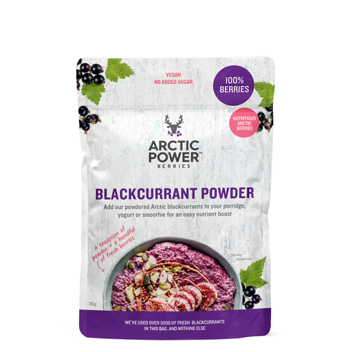 A close-up of a 30g package of Arctic Power Berries Blackcurrant Powder featuring a spoonful of vibrant, dark purple powder made from Finnish Arctic blackcurrant berries, highlighting its natural, nutrient-dense appearance with a background of fresh blackcurrants and a wooden spoon, emphasising the product's purity and health benefits