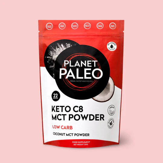 Vibrant image showcasing Planet Paleo Keto C8 MCT Powder in a clear jar with scoop, highlighting its fine white powder texture