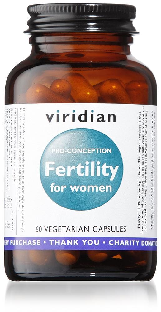 A close-up image of a bottle of Viridian Fertility for Women, 60 vegan capsules, with the label displaying detailed ingredients and nutritional information, surrounded by natural ingredients such as bilberry, spirulina, and alfalfa, emphasising health, wellness, and reproductive support for women planning conception