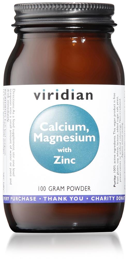 A spoonful of Viridian Calcium Magnesium with Zinc Powder being mixed into water, highlighting its fine powder texture and vibrant packaging