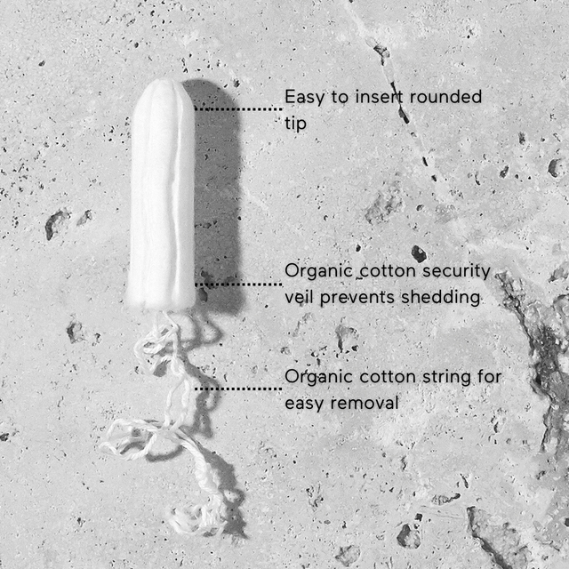 Close-up of &Sisters Naked Tampons showing biodegradable packaging and natural cotton material for sustainable menstrual protection