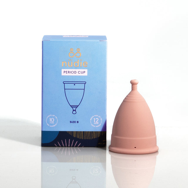 Silky smooth &Sisters nüdie Size B menstrual cup with Pebble™ pull and release holes