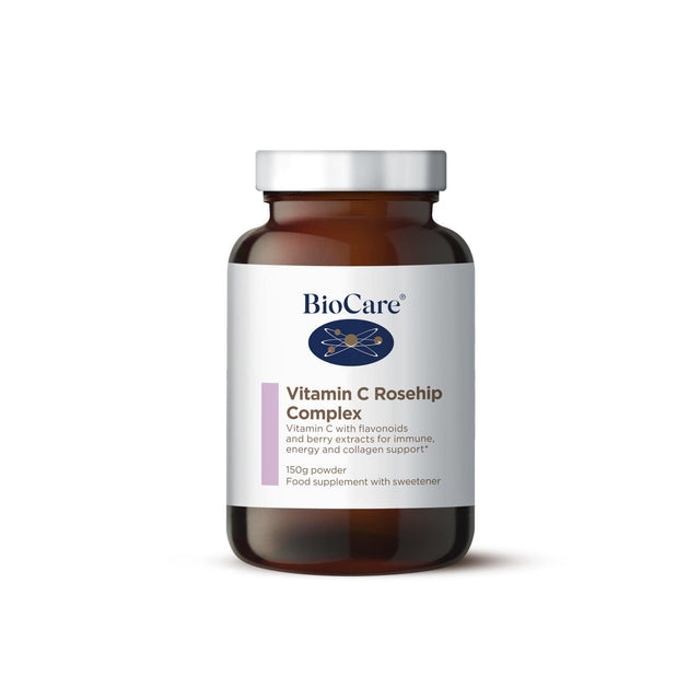 A close-up of Biocare Vitamin C Rosehip Complex powder in a transparent jar, showing the creamy powder with a spoon beside it, highlighting its natural ingredients like rosehip and berry extracts for immune support and skin health