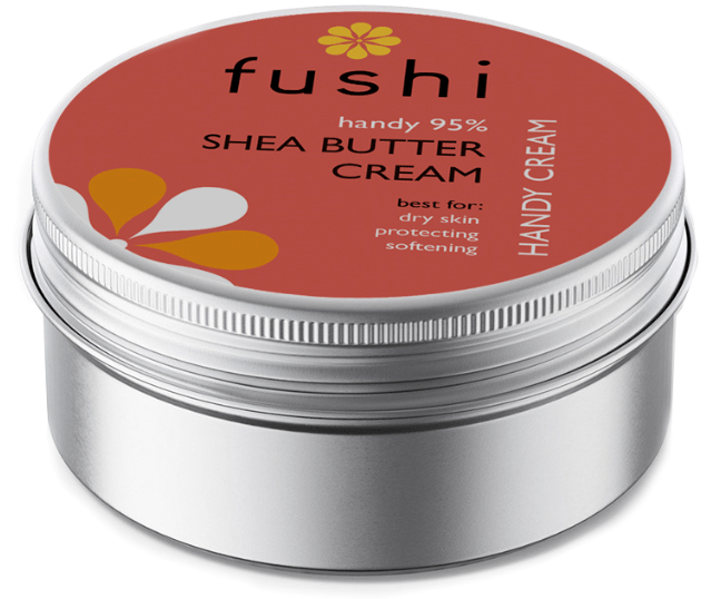 Close-up of Fushi Shea Handy tin showcasing creamy shea butter and coconut oil blend