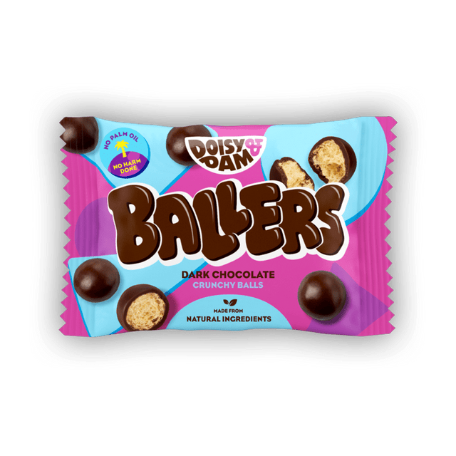 A close-up of Doisy & Dam Dark Chocolate Ballers, 25g, featuring golden malty crunchy cereal balls coated in smooth, velvety dark chocolate, with detailed texture and glossy finish
