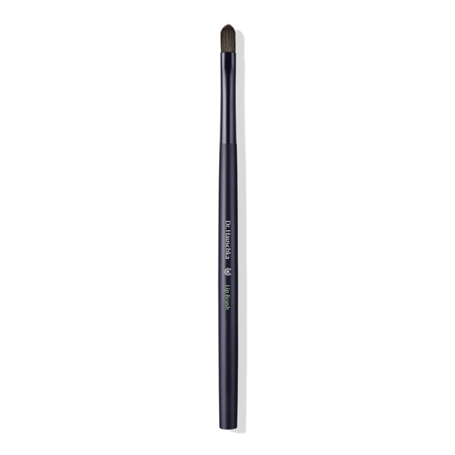 A close-up image of the Dr Hauschka Lip Brush with narrow synthetic hairs for precise lip and concealer application, showing the flat, rounded brush head designed for even colour application and detailed line work