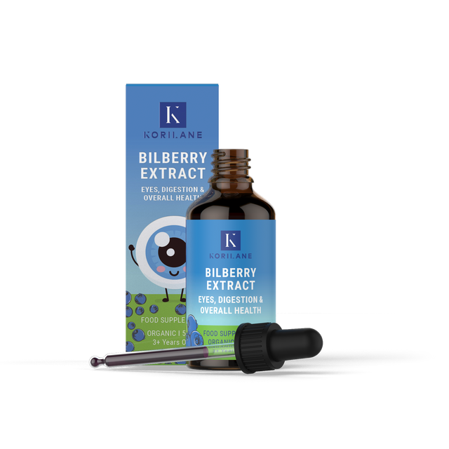 Child's hand holding a dropper filled with Korilane Bilberry Extract ready for use