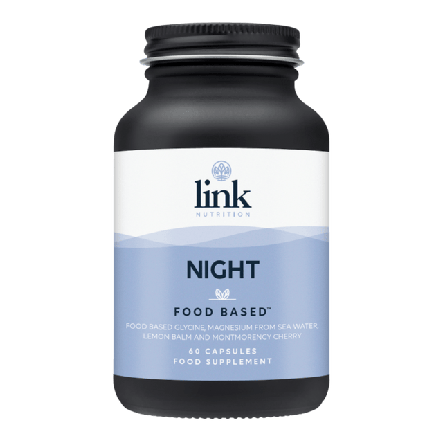 A close-up of Link Nutrition Night capsules, featuring magnesium, herbal extracts, and medicinal mushrooms for promoting restful sleep