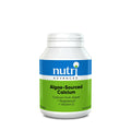 A close-up image of Nutri Advanced Algae Sourced Calcium capsules, showing their easy-to-swallow, non-chalky, plant-based capsules designed to support healthy bones with algae-derived calcium, magnesium, vitamin D3, boron, and other nutrients