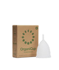 A woman inserting OrganiCup Size B with folded silicone cup during period