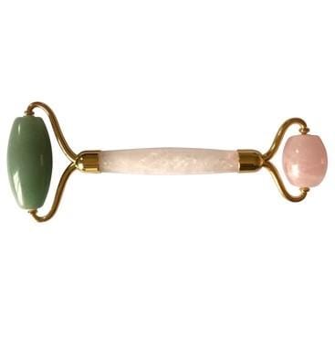 A dual-ended gemstone facial roller featuring aventurine and rose quartz for soothing and reducing puffiness
