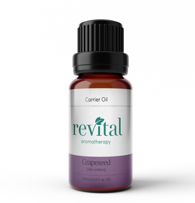 A 100ml bottle of Revital Grapeseed Carrier Oil, showcasing a clear, light vegetable oil suitable for massage and skincare applications