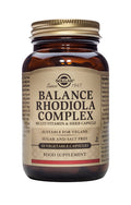 An illustration showing the Solgar Balance Rhodiola Complex bottle alongside natural botanical ingredients like Rhodiola root, Siberian ginseng, and vegetables, highlighting its comprehensive adaptogen formula