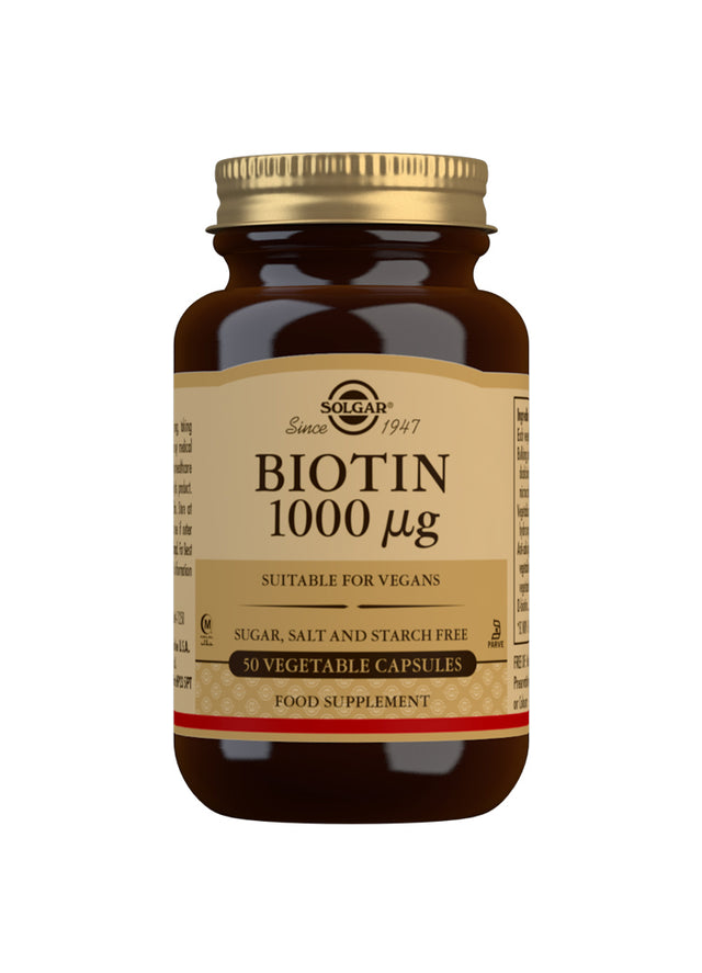 A close-up of Solgar Biotin 1000µg capsules in a clear container, highlighting the supplement's packaging and label