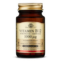 An image displaying two Solgar Vitamin B12 chewable nuggets, highlighting their convenient size and the natural cherry flavour label for supporting energy and nervous system health