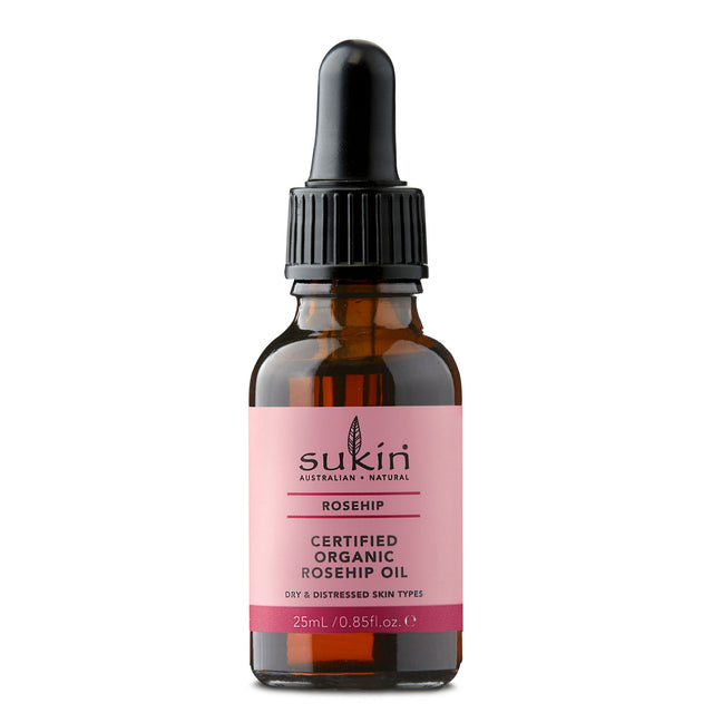 A 50ml bottle of Sukin RoseHip Oil showcasing the glass container with a dropper, highlighting its natural, cold-pressed formulation rich in essential fatty acids, vitamin E, beta carotene, and lycopene, designed to nourish and promote healthy, radiant skin