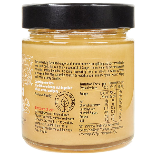 Serving spoon with a generous scoop of Honey Lovers Honeyboost Ginger & Lemon Honey highlighting its spiced, nourishing qualities