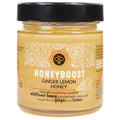 Rich jar of Honey Lovers Honeyboost Ginger & Lemon Honey showcasing its creamy texture and natural ingredients