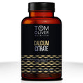 Calcium Citrate capsules by Tom Oliver Nutrition displaying their dairy-free, high bioavailable calcium content