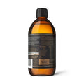 Close-up of the label on the 500ml bottle of Ancient and Brave True MCT oil highlighting its coconut-based, solvent-free, vegan, keto-friendly description