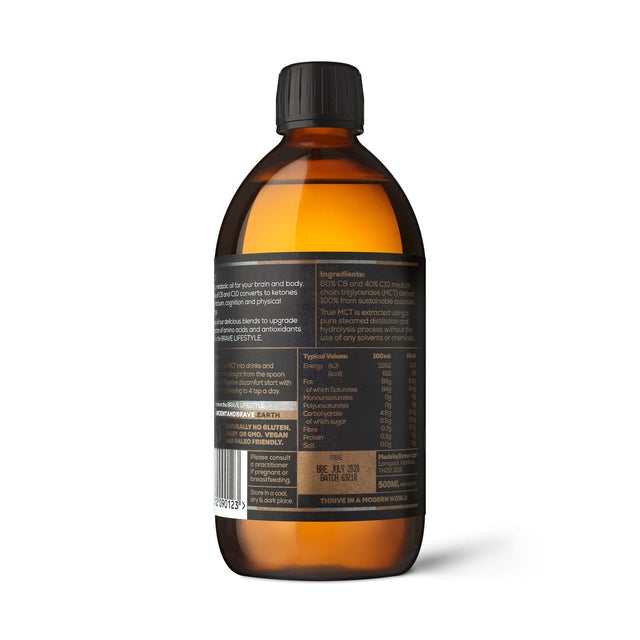 Close-up of the label on the 500ml bottle of Ancient and Brave True MCT oil highlighting its coconut-based, solvent-free, vegan, keto-friendly description