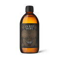 A 500ml bottle of Ancient and Brave True MCT oil showcasing its clear, light, and flavourless liquid form