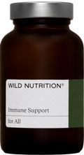 Fresh capsules of Wild Nutrition Iron Plus with natural food-based iron, vitamin C, and bioflavonoids inside a glass jar