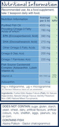 Refrigerated bottle of Wiley's Finest Orange Burst Fish Oil with a glass of the oil poured into a measuring spoon, emphasising freshness and natural ingredients