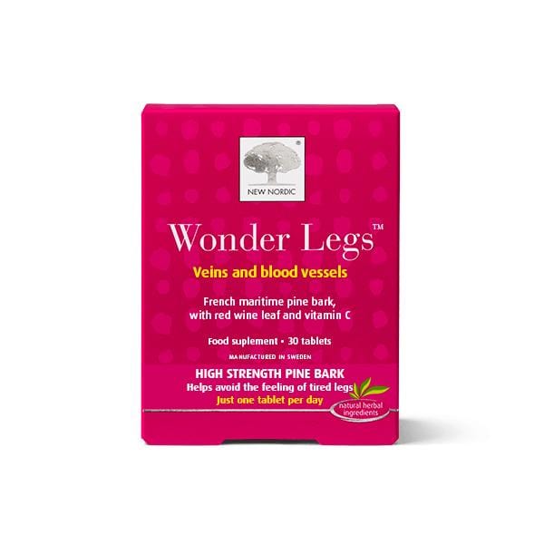 A bottle of New Nordic Wonder Legs 60 tablets alongside herbal extracts of French maritime pine bark, red vine leaf, black pepper, and vitamin C capsules, illustrating supplement for healthy vein and blood vessel function to reduce tired legs after prolonged standing or sitting